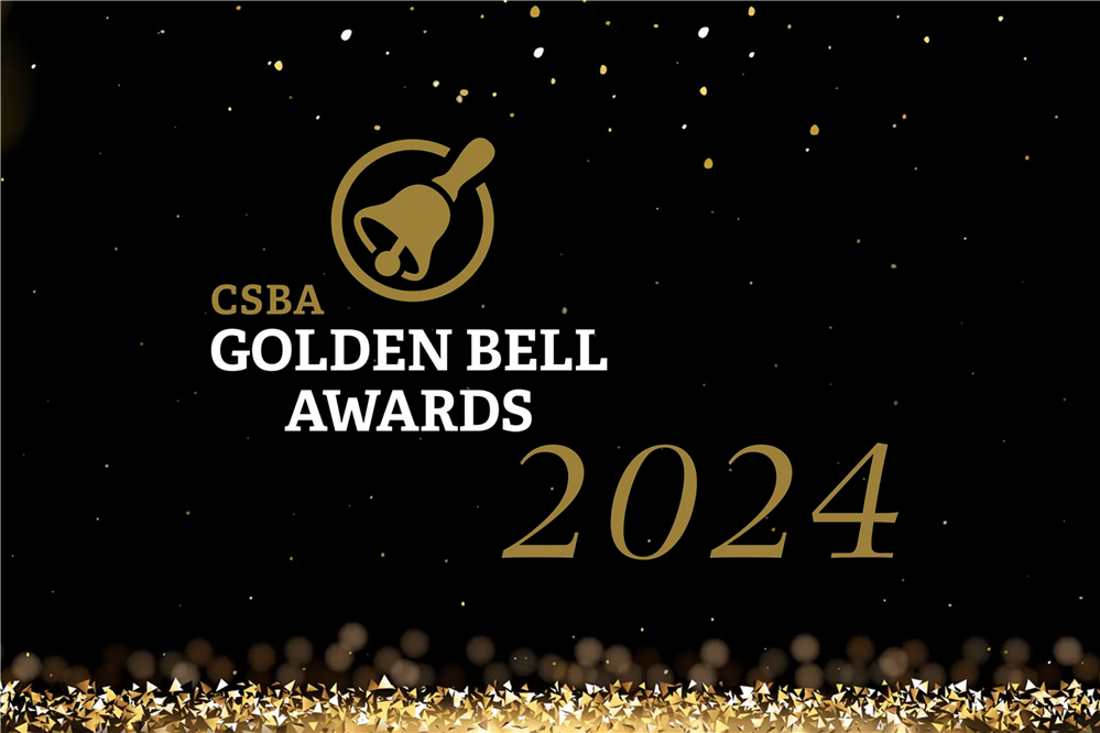  Black background with bright circles of golden hues and glitter on the bottom. CSBA Golden Bell 